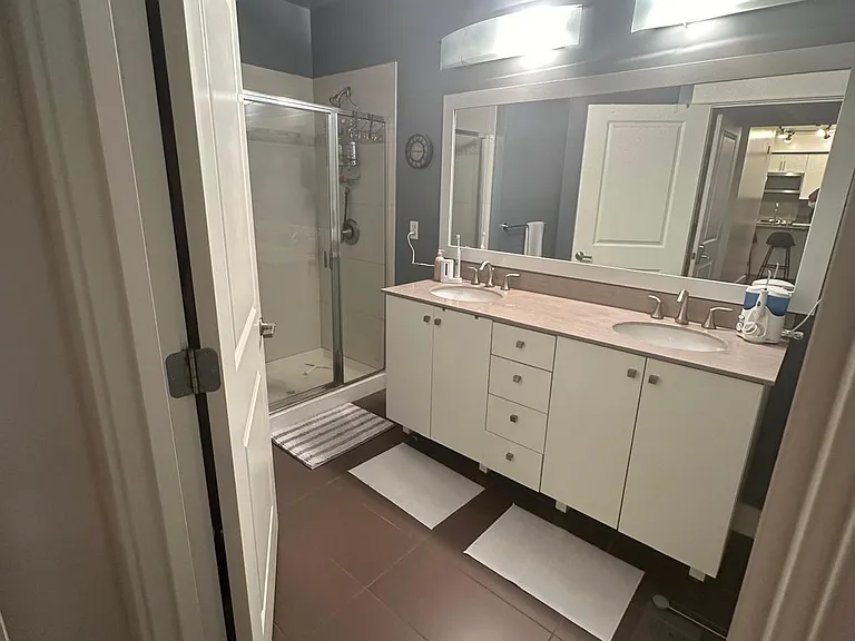 Master Bath with double sinks and a walk in shower