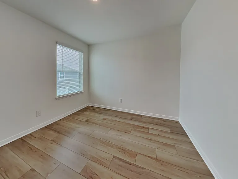 Brightly lit, spacious room wi