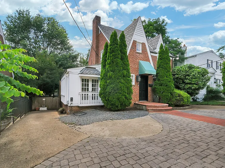 Two driveway entrances and plenty of driveway space.