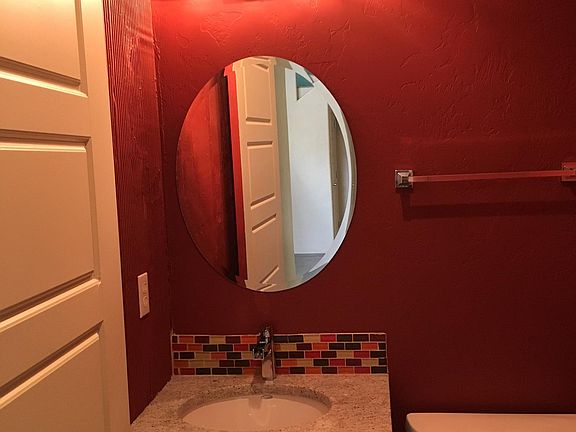 Half bath downstairs, it's no longer red, it's white!