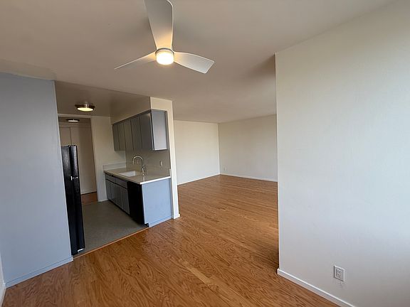 View of kitchen and living area from dining room