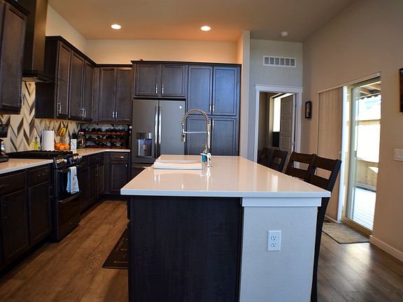 5th image of 9416 E 58th Pl