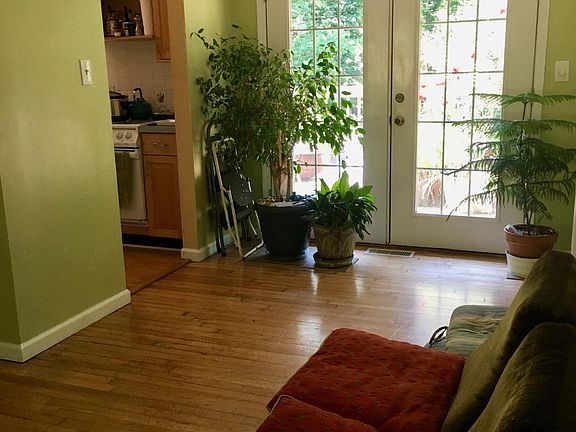 Living room open space with double ceiling fans and french d
