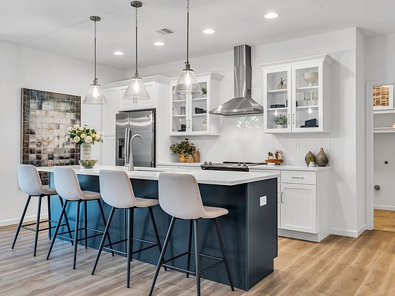 Kitchen with Center Island of the Maeve Model from Garman Builders