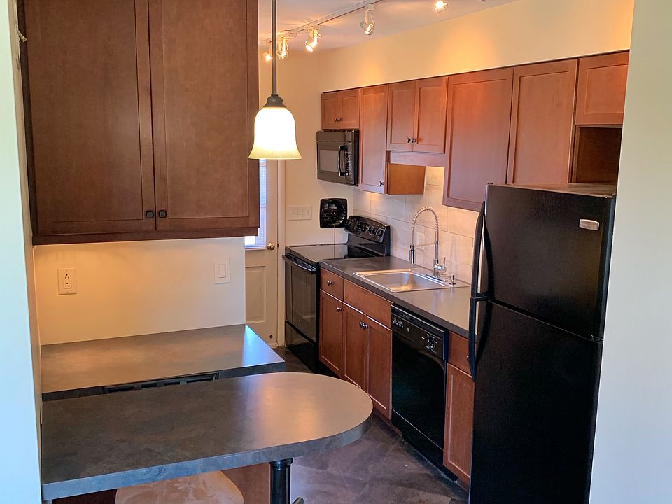 Updated kitchen with high top table for dining or working.