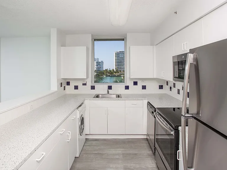 Kitchen features stainless steel appliances