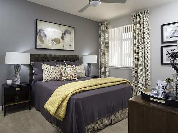 Spacious bedrooms with ceiling fans