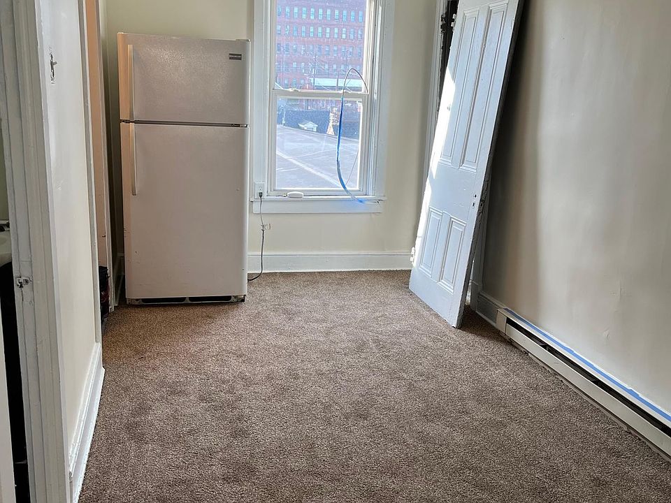 The door was off due to carpet install. This would be the quaint living room.
