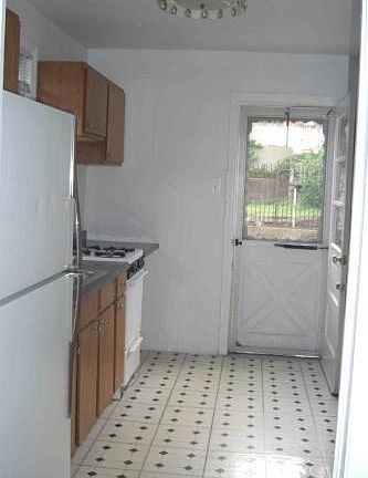 Kitchen opens to private backyard