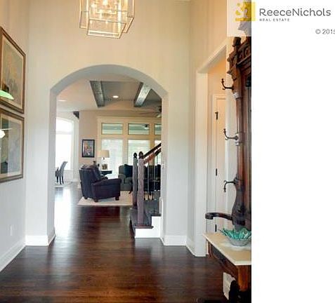 Gleaming wood floors, Upgraded lighting and Spacious floor plan.