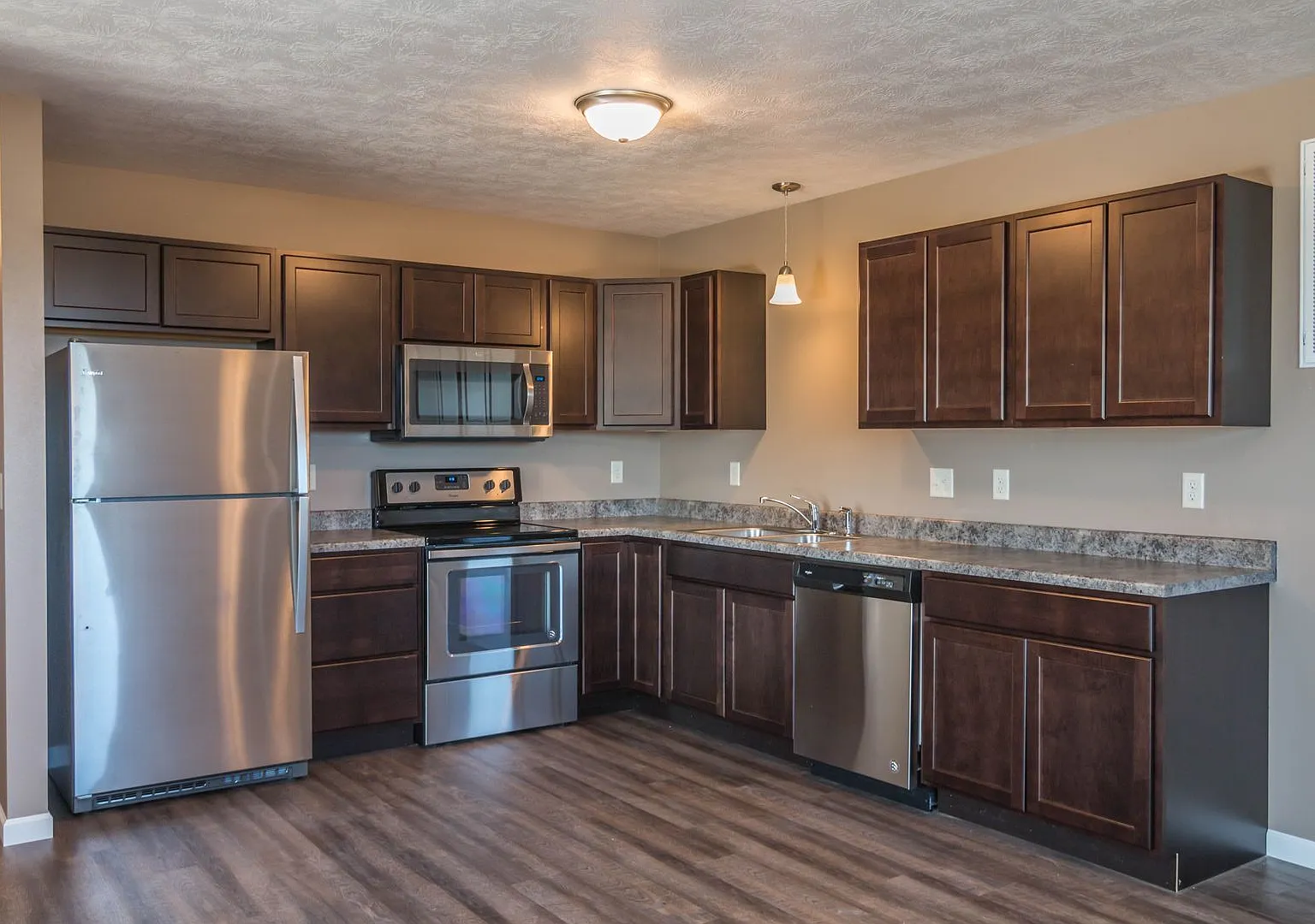 3 Bedroom Barker Place Townhome with Attached Garage & In-Unit Laundry — Photo 3