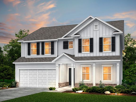 Mitchell Exterior LC2H with a front porch and stone accents