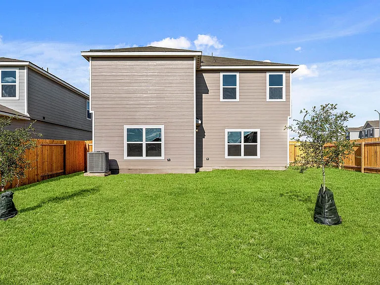 Backyard with landscaping and privacy.