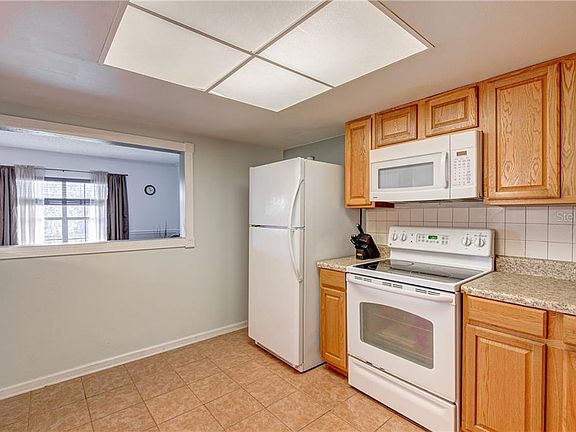 5th image of 930 85th Ave N APT 302