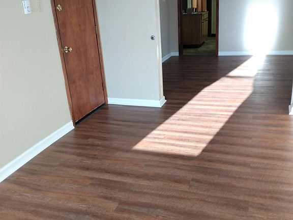 View of Living room, dining room and kitchen.