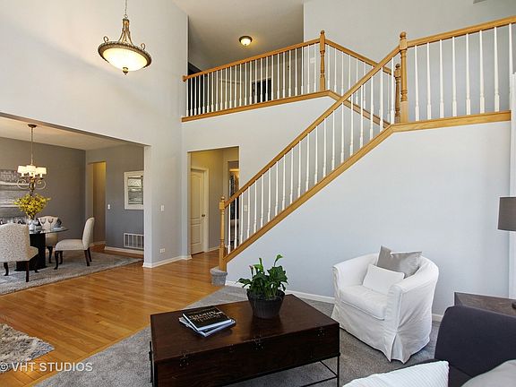 Traditional center entry plan with a twist! Soaring open Foyer & Parlor size LivRm, spacious DinRm. Grand Staircase with window over landing,