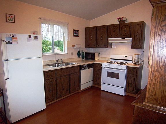 Bright Kitchen with laminate wood floor