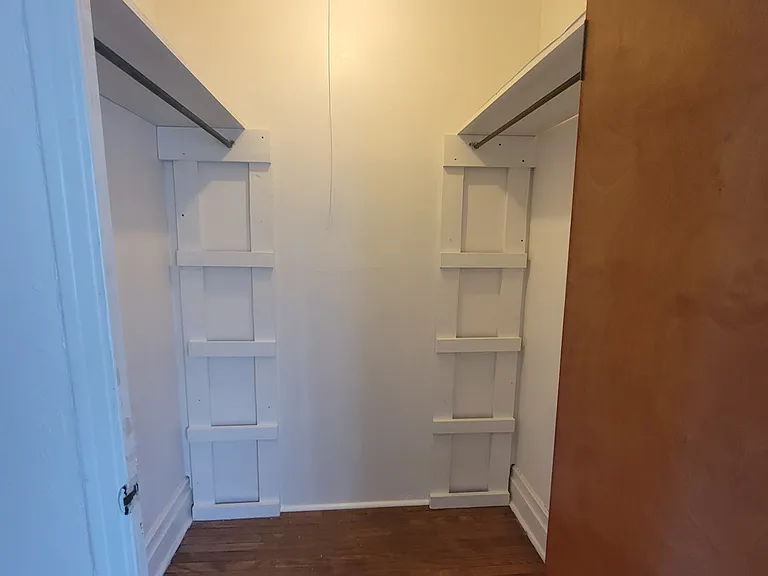walk in closet in bedroom one