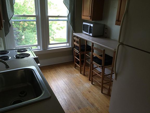 The fridge was recently replaced (Aug. 2025) with a brand new red fridge.