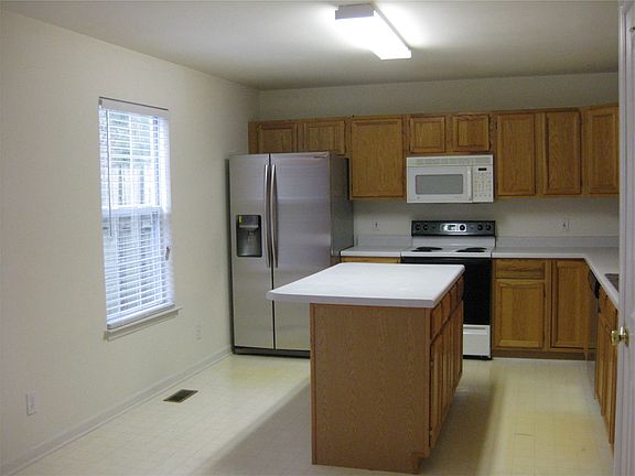 kitchen with new Sumsang refrigirator