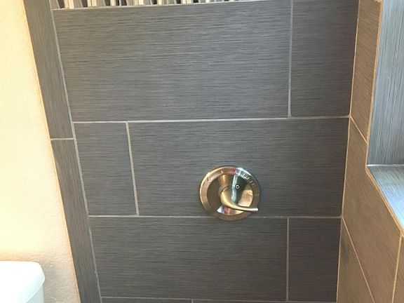 Complete shower update new tile, fixtures,flooring, toilet,