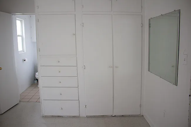 built in closet and drawers in bedroom