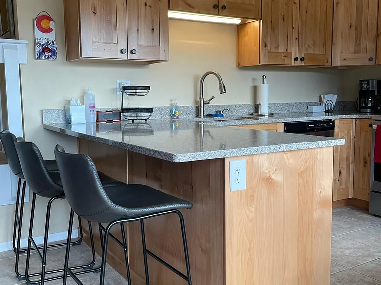The renovated kitchen has all the standard appliances, as well as a crockpot and blender.