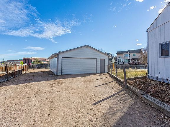 Approx 35'x25' garage plus shed