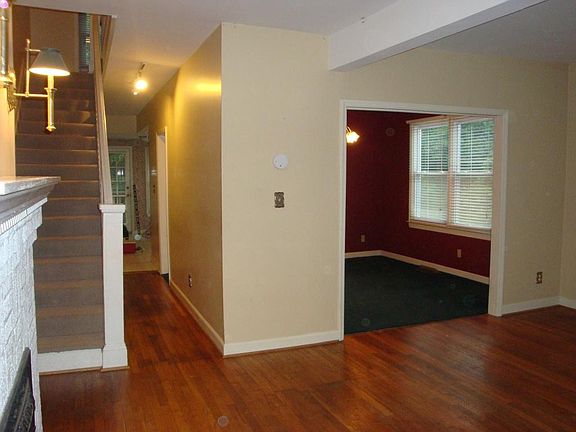 view of dining room hallway and portion of kitchen