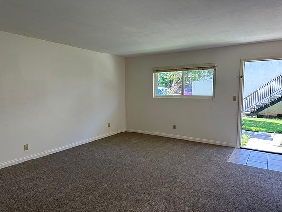 Living room looking out the front door.