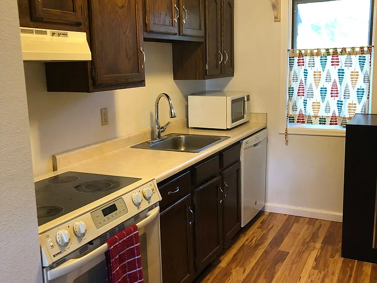 Galley kitchen- kitchenware provided