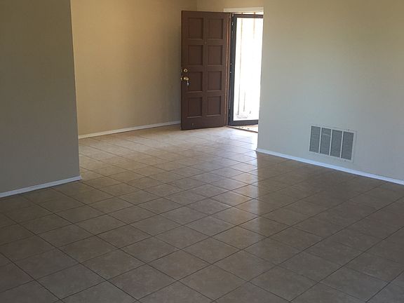 Dining Room View to Living and Entry Way