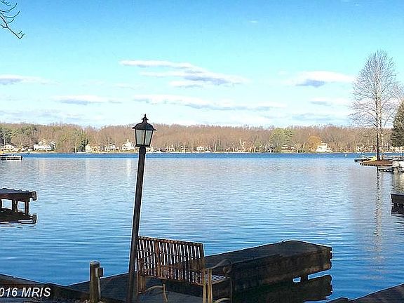 Swiming area with stairs to the left of the dock