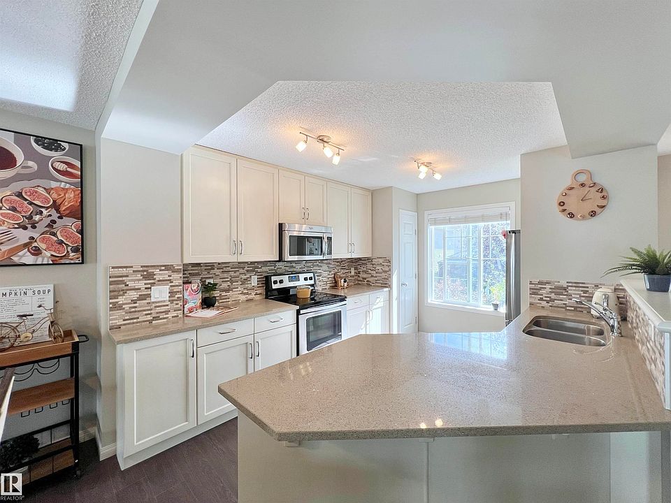 1st image of 7385 Edgemont Way NW #35