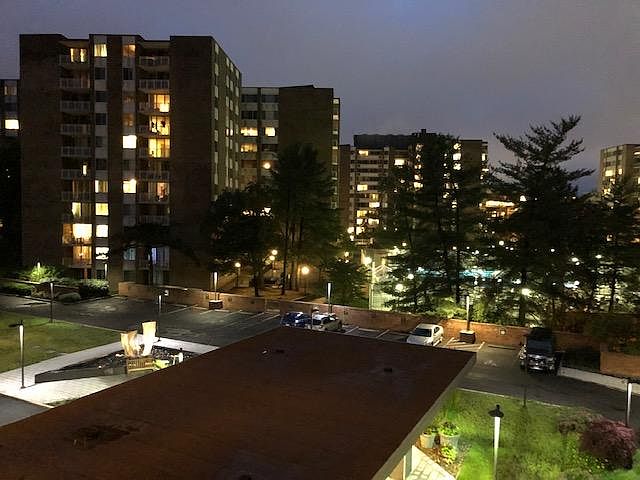 Dramatic night views of front plaza from the balcony--a cityscape to call home!