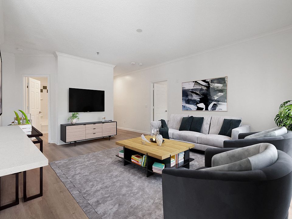 Spacious living rooms with luxury vinyl plank flooring