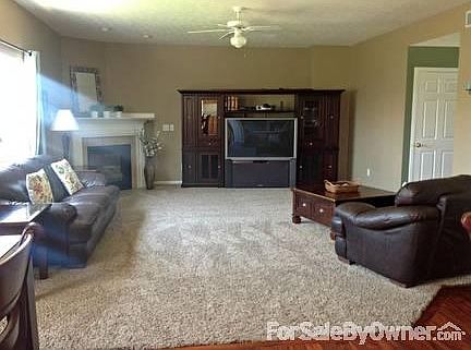 Living Room
						:
						Custom, open floor plan great for entertaining!