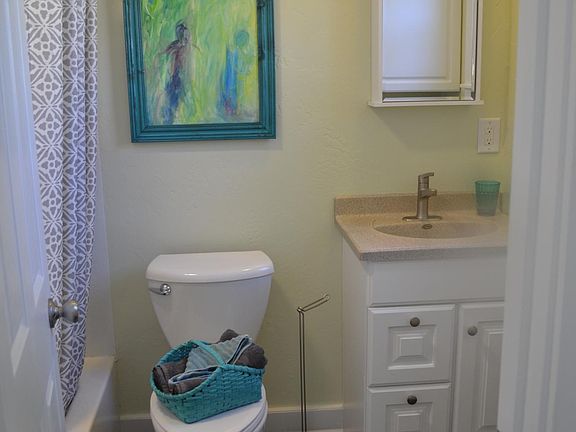 Bathroom has tub/shower combo.