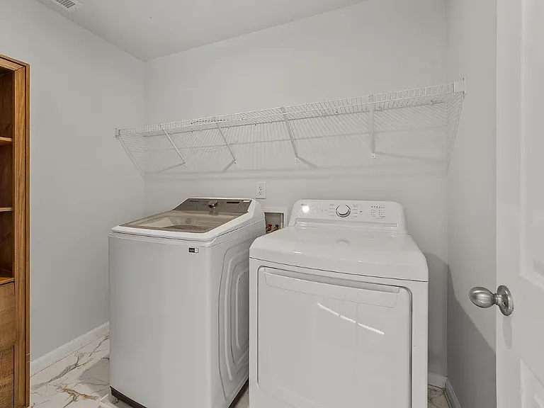 Laundry Room with washer and dryer