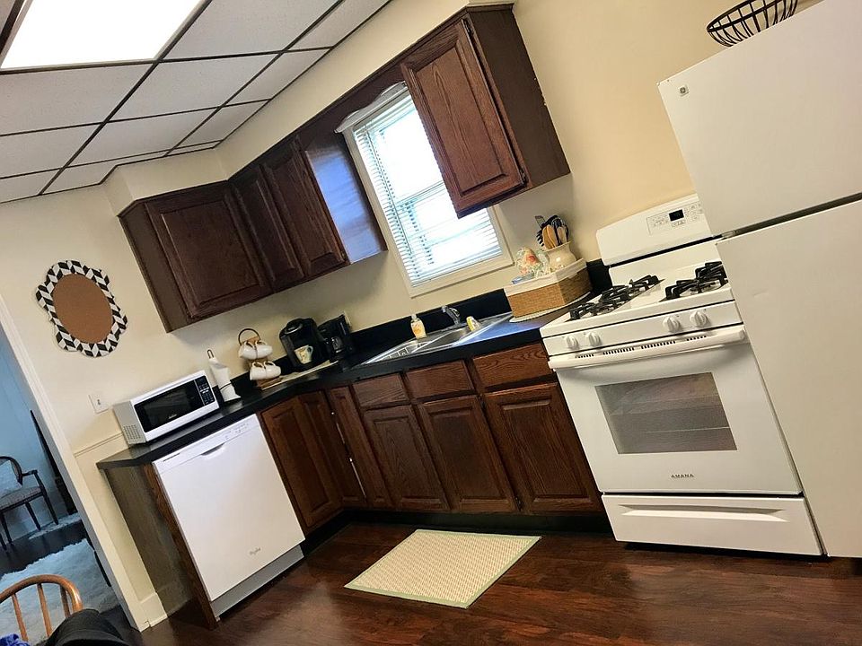 Kitchen with new stove & dishwasher