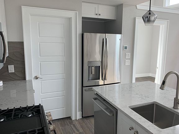 Full-size stainless steel appliances included