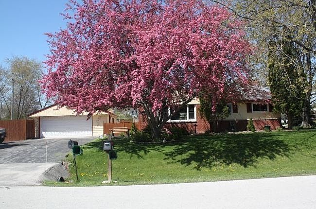 1st image of 8371 N 61st St
