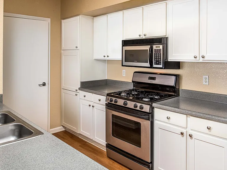 Spacious kitchens with food flooring throughout