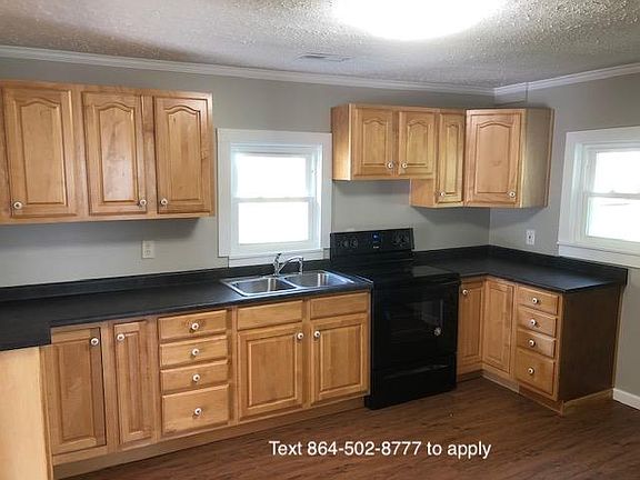 New countertops and solid wood cabinets