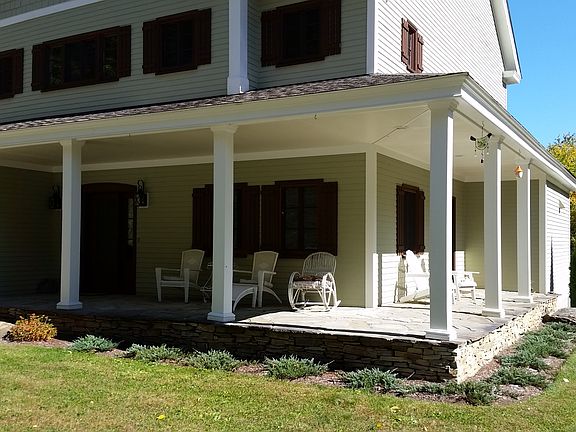 wraparound stone porch