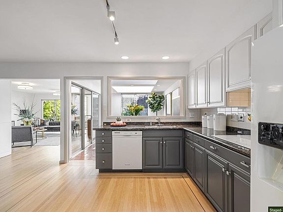 Kitchen - flows nicely from Living to Dining and Family rooms