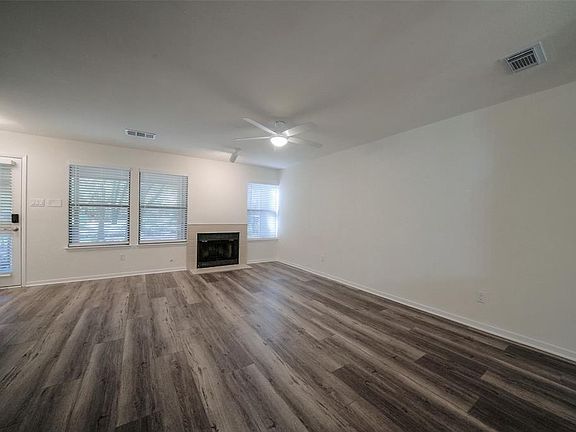 Large beautiful family room with focal fireplace
