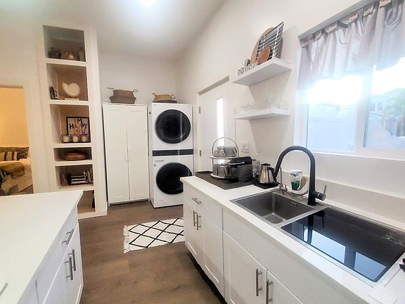 Touches kitchen faucet and in-sink dishwasher ;). Coffee station.
