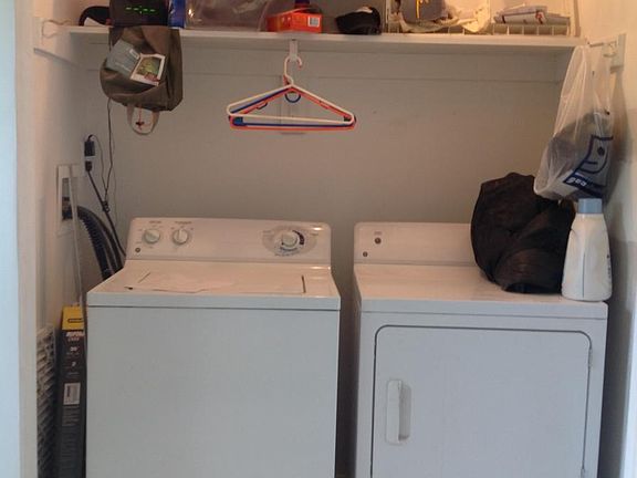 full size washer and dryer off kitchen