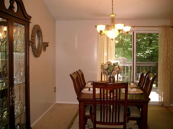 Dining Room w/ Vaulted Ceilings
